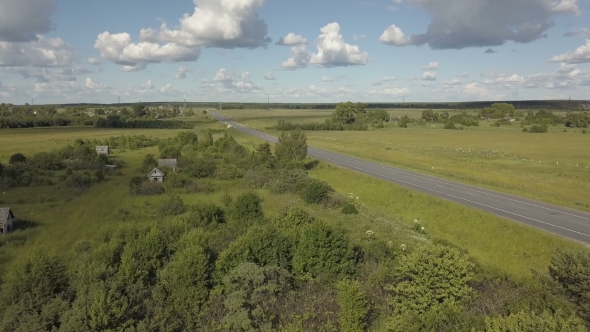 Highway Road Traffic in a Valley . Aerial Shoot of a Highway Road with Traffic Cars in a Valley with alt