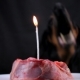 The Dog Is Trying To Blow Out a Candle in a Festive Piece of Meat - VideoHive Item for Sale