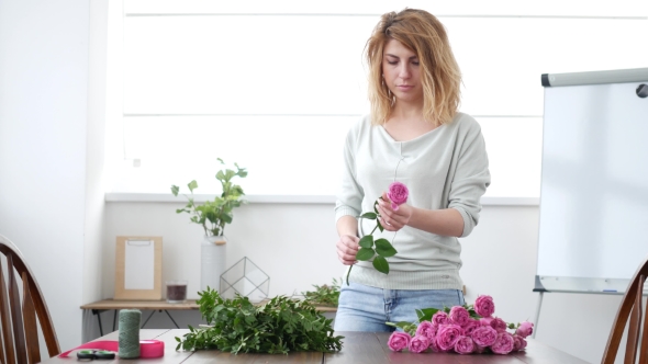 Woman Florist Makes Flower Bouquet