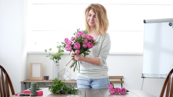 Woman Florist Makes Flower Bouquet