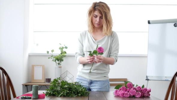 Woman Florist Makes Flower Bouquet