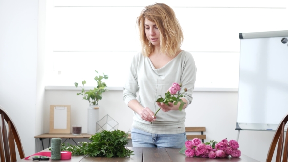 Woman Florist Makes Flower Bouquet