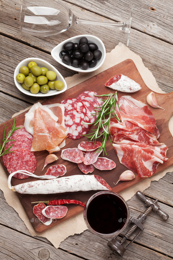 Salami, ham, sausage, prosciutto and wine - Stock Photo - Images
