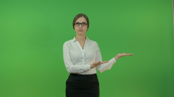 Business Lady Gesturing with Hands on a Green Background. Presentation.