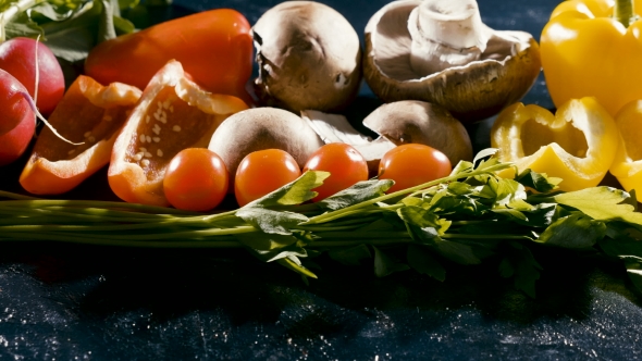 Organic and Fresh Vegetables on Dark Wooden Background alt