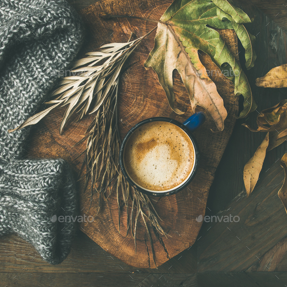 Autumn morning coffee concept with leaves and sweater, square crop - Stock Photo - Images