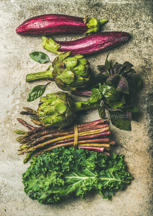 Flat-lay of fresh green and purple vegetables, vertical composition - Stock Photo - Images