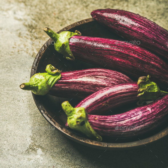 Fresh raw Fall harvest purple aubergines, square crop - Stock Photo - Images