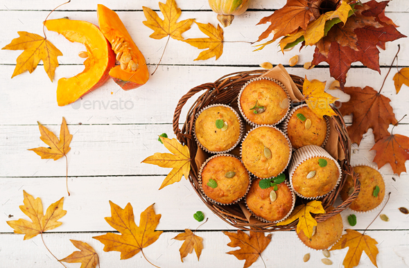 Appetizing and ruddy muffins with pumpkin and walnut. Flay lay. Top view