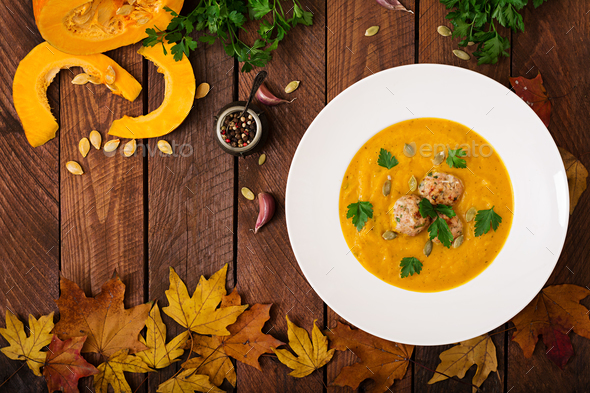 Delicious cream of pumpkin soup with meatballs - Stock Photo - Images