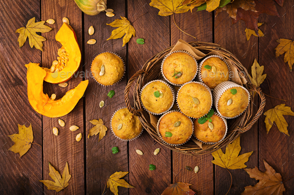 Appetizing and ruddy muffins with pumpkin and walnut. Flay lay. Top view