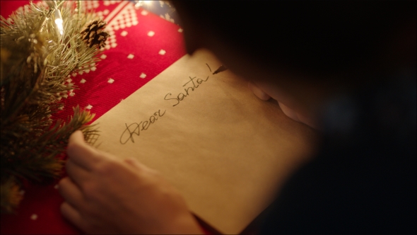 Hand-writing of Dear Santa on the Parchment Letter Paper on Christmas Eve alt