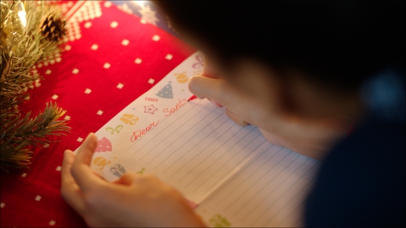 Girl Writing a Letter To Santa Claus  alt