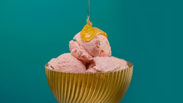 Strawberry Ice-cream with Honey in Bowl