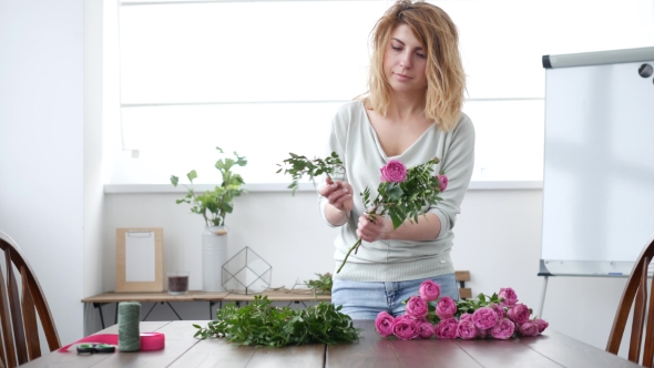 Woman Florist Makes Flower Bouquet