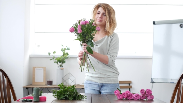 Woman Florist Makes Flower Bouquet