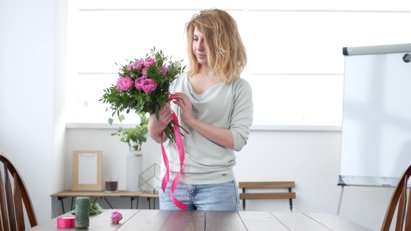 Woman Florist Makes Flower Bouquet