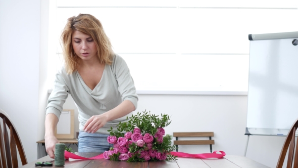 Woman Florist Makes Flower Bouquet