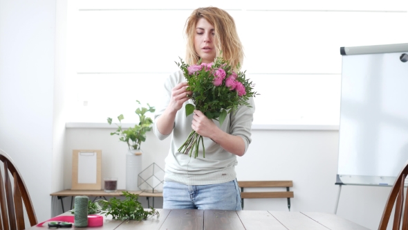 Woman Florist Makes Flower Bouquet