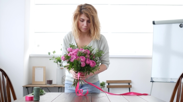 Woman Florist Makes Flower Bouquet