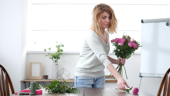 Woman Florist Makes Flower Bouquet