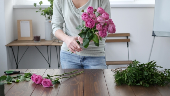 Florist Prepares a Bouquet of Flowers for Sale