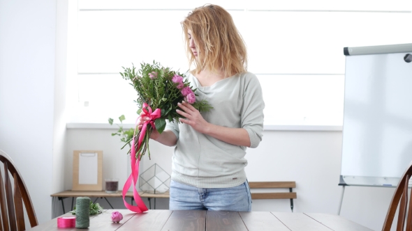 Woman Florist Makes Flower Bouquet