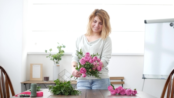 Woman Florist Makes Flower Bouquet