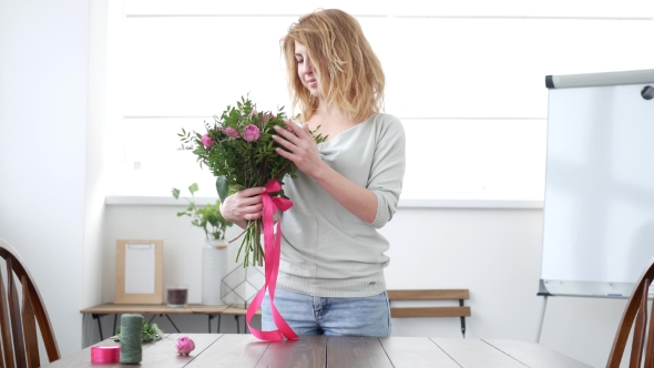 Woman Florist Makes Flower Bouquet