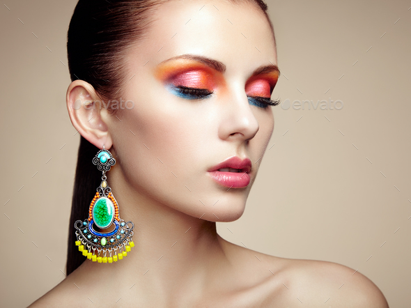 Portrait Of Beautiful Young Woman With Earring. Jewelry And Acce Stock 