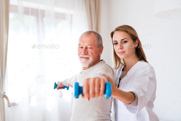 Health visitor and senior man during home visit. - Stock Photo - Images