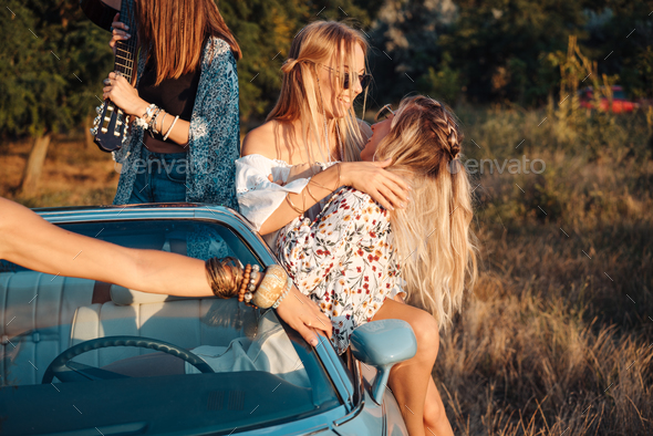 Girls have fun in the countryside Stock Photo by simbiothy | PhotoDune