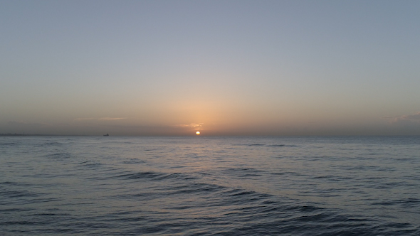 Drone In Dawn Sun On The Ocean