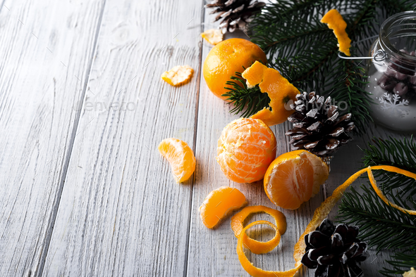 Tangerine and fir branches - Stock Photo - Images