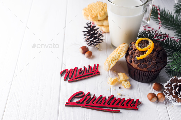 chocolate muffins with jug with milk - Stock Photo - Images