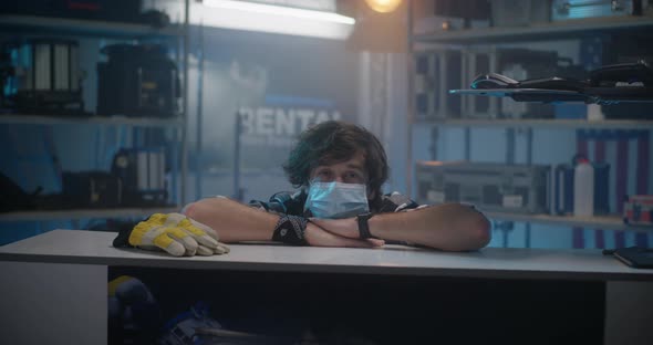 Clerk Wearing Mask in Video Equipment Store alt