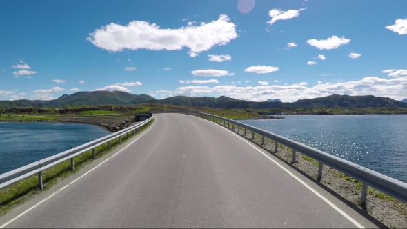 Driving a Car on a Road in Norway Atlantic Ocean Road alt