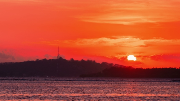 The Sunsets Over the Mountain of the Island of Gili, Indonesia