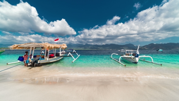 Traditional Boats on Gili Island Beach in Indonesia alt