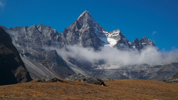 Clouds and Mountains in the Himalayas alt