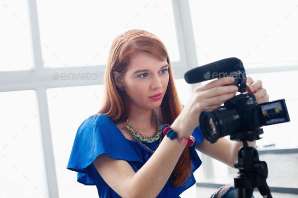 Woman Recording Vlog Video Blog Using DSLR Camera - Stock Photo - Images