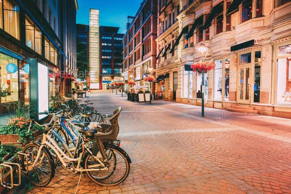 Helsinki, Finland. Bicycles Parked Near Storefronts In Kluuvikat - Stock Photo - Images
