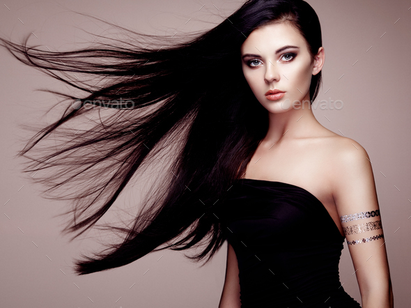Fashion portrait of elegant woman with magnificent hair - Stock Photo - Images