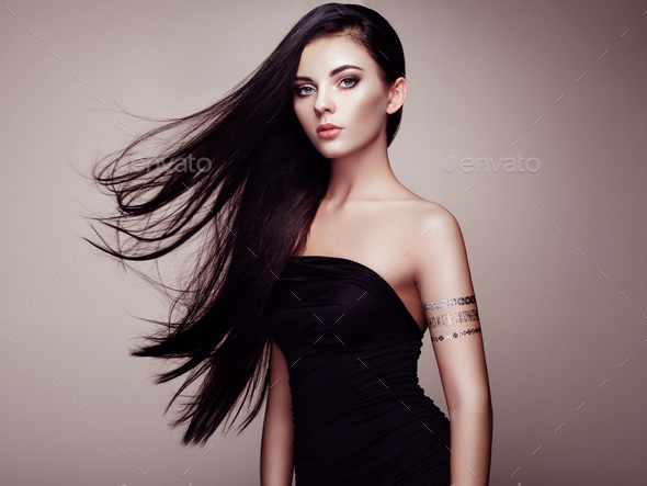 Fashion portrait of elegant woman with magnificent hair - Stock Photo - Images