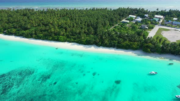 Tropical fly over abstract shot of a paradise sunny white sand beach and blue sea background  alt