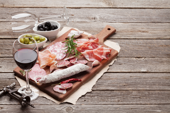 Salami, ham, sausage, prosciutto and wine - Stock Photo - Images