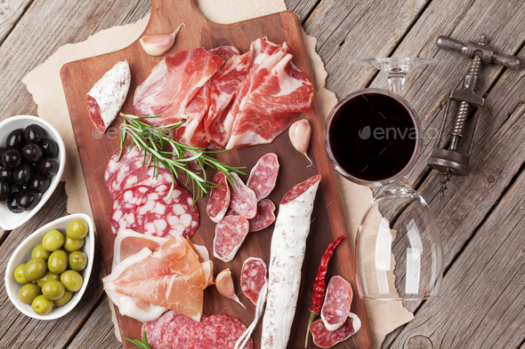 Salami, ham, sausage, prosciutto and wine - Stock Photo - Images
