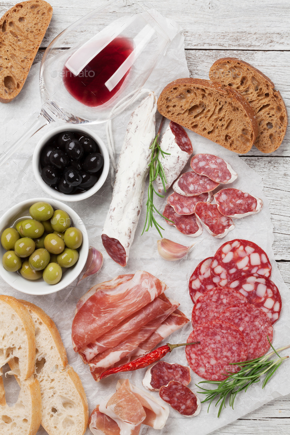 Salami, ham, sausage, prosciutto and wine - Stock Photo - Images