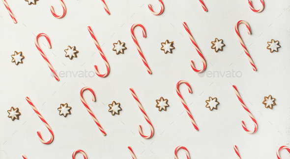 Christmas holiday food pattern with candy-cane and cookies, top view - Stock Photo - Images