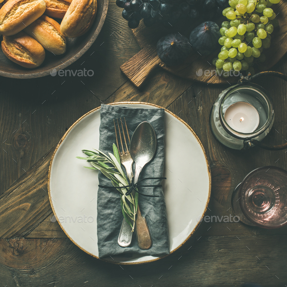 Fall table decoration setting with cutlery and snacks, copy space - Stock Photo - Images